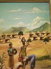 African Village Oil On Canvas Painting by J.H Chilungo 17 1/2 x16 1/4 H Framed
