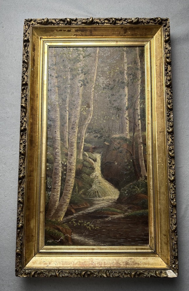 Antique oil on canvas of forest and stream in carved gilt frame