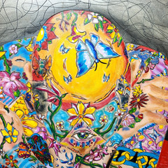 Tattooed nude bald woman chair painting human figure etched art colorful gallery