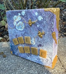 small paint pour art collage wall hanging, purple and gold with scrabble tiles