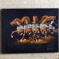 roman chariot painted on black velvet