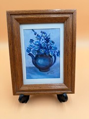 Blue flowers signed by artist Janis McMahon, 2004