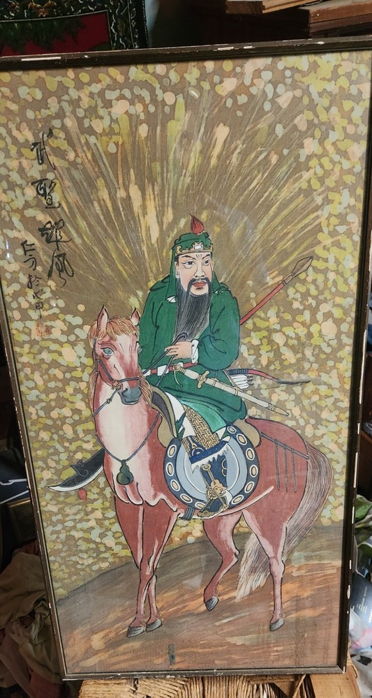 伍万隆 Signed Chinese Painting Man on Horseback Fabric, 17 1/2 “ x 34″ framed.