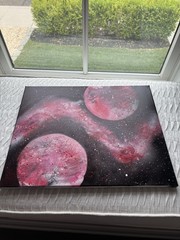 A Custom Spray Painted Picture Of Outer Space On A 16×20 Canvas