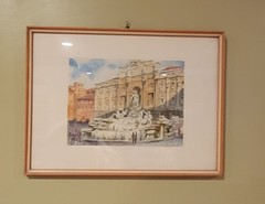 Trevi Fountain in Rome, Italy, signed by an artist named A. Lazzarini. 