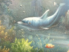 Oil Painting of underwater dolphins 16 inches wide 12 inches tall – Signed