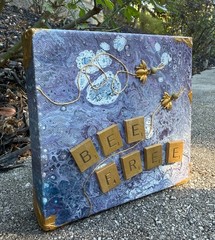 small paint pour art collage wall hanging, purple and gold with scrabble tiles