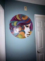 vintage art style on round board 24×24