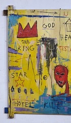 JEAN-MICHEL BASQUIAT ACRYLIC ON CANVAS 1982 WITH TIED WOOD SUPPORTS 32 X 32 IN.