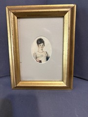 Antique watercolor portrait of a lady wearing an Empire dress and a red necklace