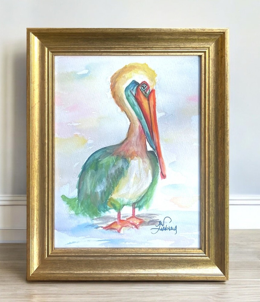 Colorful Pelican watercolor print of a painting framed, has a stand & hinge