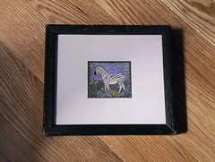 Art featuring a zebra in a safari setting. 7″ X8″ Fram 2 3/4 X 2 1/2 Matted
