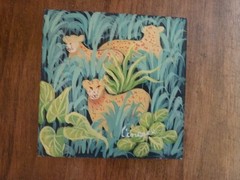 Signed Haitian Painting of Leopards,Cheetas in Lush Jungle 3 1/2 X 3 1/2 inches.