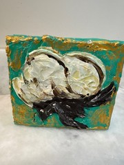 The painting uses a heavy impasto technique, giving the cotton bolls a 3D, textu