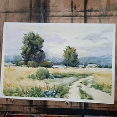 Watercolor painting. Landscape with field and trees.