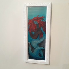 Mermaid playing a guitar. Framed print on paper 12 in x 4 in