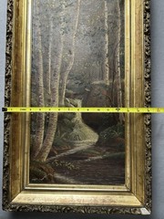 Antique oil on canvas of forest and stream in carved gilt frame