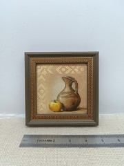 Original oil painting of a jug and apple signed in a frame size 4×4 inches