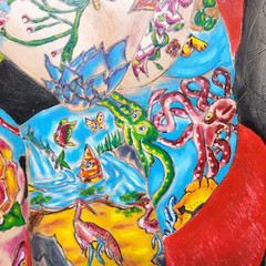 Tattooed nude bald woman chair painting human figure etched art colorful gallery