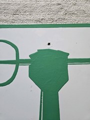 Street Grafitti Art Painted Sign Green Arm Pitchfork Empowerment Zone White