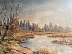 Oil painting undetermined sign. River landscape with trees under cloudy sky