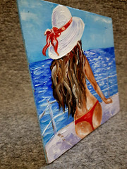 Oil painting.Girl in a hat on a yacht looks into the distance.Modern mini art.
