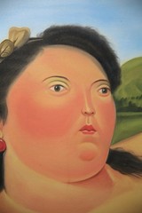 „Colombiana“ Reclining Nude Woman Oil Painting in the Manner of Fernando Botero