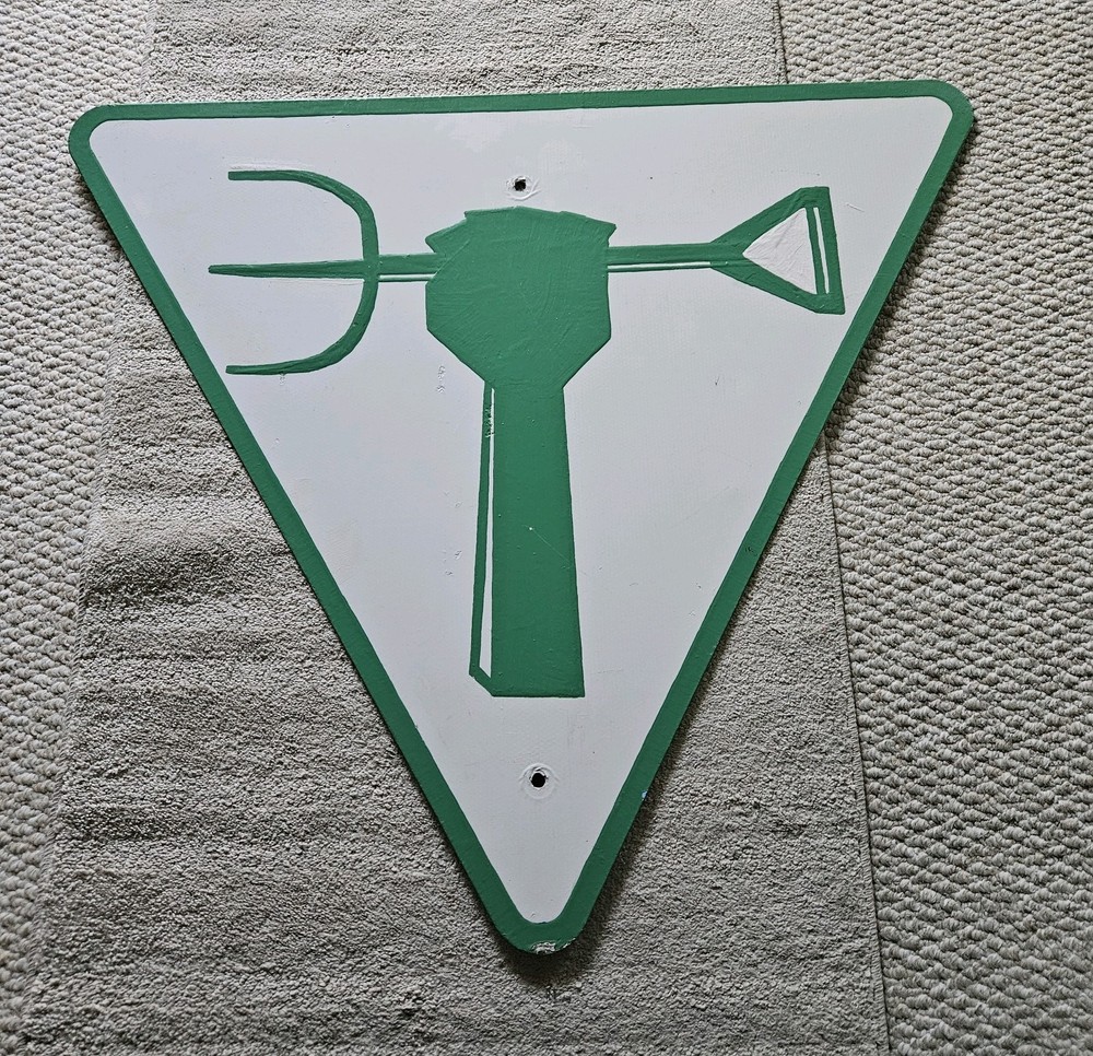 Street Grafitti Art Painted Sign Green Arm Pitchfork Empowerment Zone White