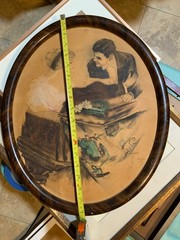 Oval framed Watercolor and Charcoal depicting man and woman, signed by Paul Conn