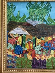 Framed Original Hand Painted Scene Of A Haitian Village. Signed By Artist.