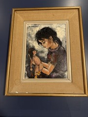 Girl holding doll by Etienne Roth