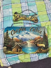 Folk Art Paintings 18″ X 12″ & 11″ X 3″ Cabin & Dog Bone
