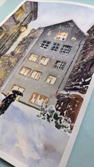 Urban Winter City Street Watercolor Painting Snowy Houses Windows Lights Art