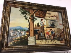 Antique Folk Art Oil/Wood Panel Blacksmith With Town in Background