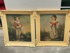 Beautful painting of a boy and girl with their pet..