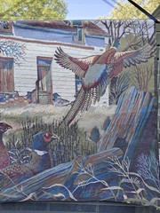 Tapestry Hanging- by Harold Roe ‚The Homestead‘ – 24″ x 24″ Wood Bar Included