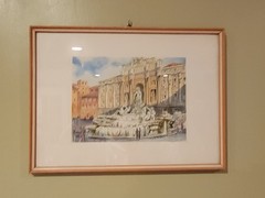 Trevi Fountain in Rome, Italy, signed by an artist named A. Lazzarini. 