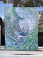Original 16×20 inch acrylic fluid art with blue, teal, white and touch of orange