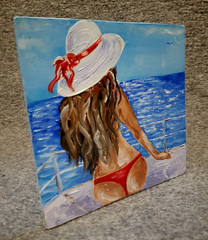 Oil painting.Girl in a hat on a yacht looks into the distance.Modern mini art.