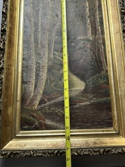 Antique oil on canvas of forest and stream in carved gilt frame