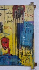 JEAN-MICHEL BASQUIAT ACRYLIC ON CANVAS 1982 WITH TIED WOOD SUPPORTS 32 X 32 IN.