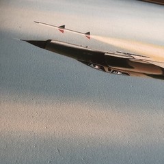 Military Fighter Plane with Falling Missile Painting by K Chong ? 1978