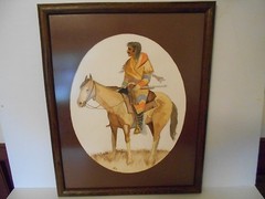 FRAMED 21 1/2″ X 17 1/2″ INDIAN ON HORSE WATERCOLOR PAINTING BY JOHN MOLDSTAD